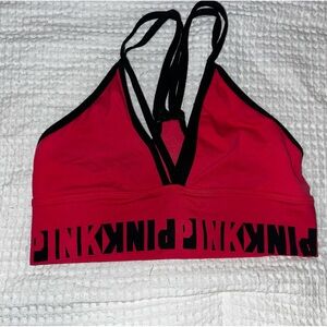 Red and black Victoria's Secret sports bra.